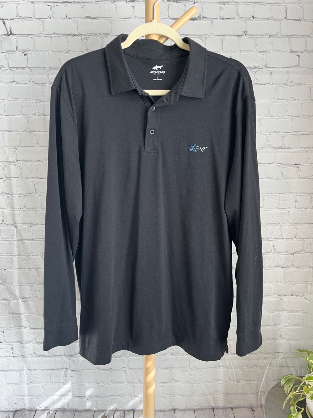 Greg Norman Men's Attack Life Black Long-Sleeve Polo Shirt with Shark Logo